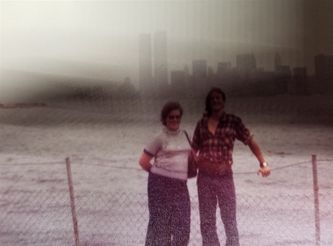 Mrs. Strainer and Phil Wilkinson at 17. They were visiting the statue of Liberty and you can see Manhattan, New York City in the fog/shade background.
