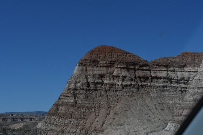 The azure back drop adds beauty to the strange formations.