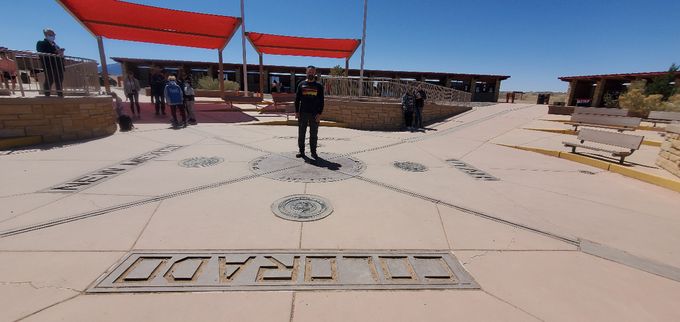 It's where you are literally standing in all four states at the same time...Colorado, New Mexico, Utah and Arizona. Just think...it only took me a few minutes to visit all four states. There were plenty of souvenirs and out door shops to shop at and eat and drink but it was more like that of mobile vendors in a shaded over head roof strip center so as to be exposed outside.