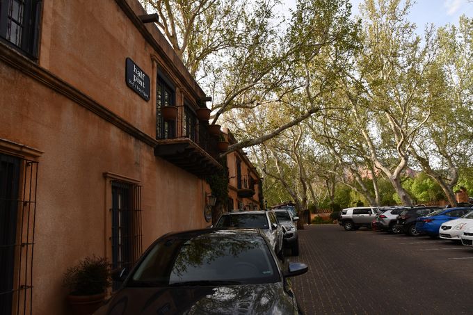 This restaurant was not only very classy and had some great authentic southwest music performed live in the courtyard, but it was a huge place. The waiting time for us was about 40 minutes but it was worth it. They were a jam packed house in both the court yard and inside. The parking area was completely full and as you can see some cars had to park on side of the building due to no empty parking spaces. Sedona and its surrounding area was  a happening. While we were waiting for a table we decided to walk around and see more of the strip center. 